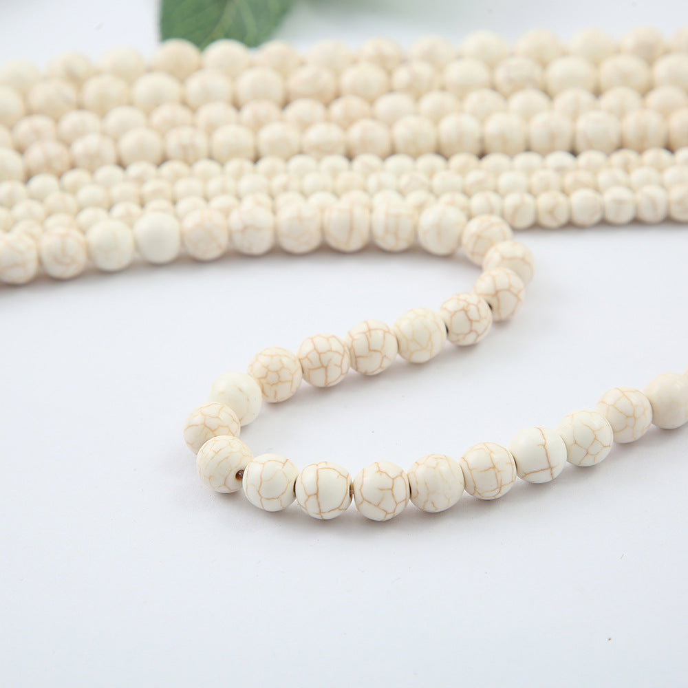 Al por mayor 10Strings/Pack Synthetic Turquesa Diy Round Beads